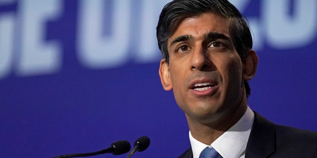 Rishi Sunak, then Britain's chancellor of the exchequer, makes a speech at the U.N. climate summit in Glasgow, Scotland, Nov. 3, 2021.