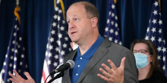 Colorado Gov. Jared Polis speaks during a news conference about Colorado offering coronavirus vaccinations to children, Thursday, Oct. 28, 2021, in Denver. (AP Photo/David Zalubowski, File)