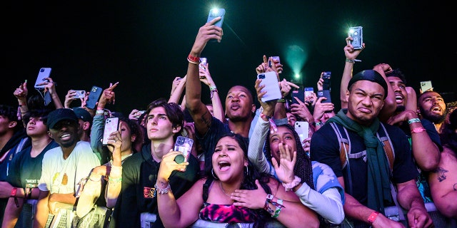 The crowd watches as Travis Scott performs at Astroworld Festival at NRG Park on Friday, Nov. 5, 2021 in Houston.