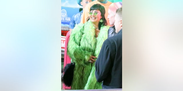 elebrities make their arrival at Paris Hilton and Carter Reum’s wedding after-party at the Santa Monica Pier in Santa Monica. Photographed here is singer Demi Lovato.