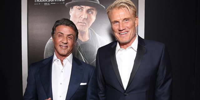 Sylvester Stallone and Dolph Lundgren attend the premiere of Warner Bros. Pictures' "Creed" at Regency Village Theatre on November 19, 2015 in Westwood, California.  