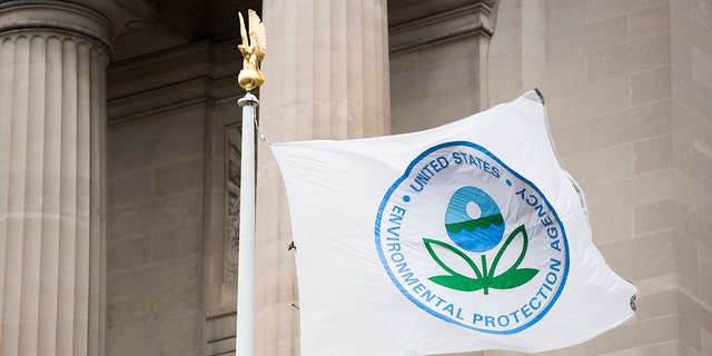 A flag with the EPA logo flies in front of the Environmental Protection Agency on Tuesday, Jan. 1, 2019.