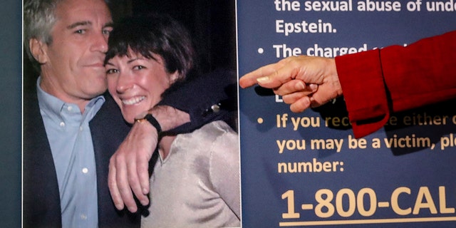 Audrey Strauss, acting U.S. attorney for the Southern District of New York, points to a photo of Jeffrey Epstein and Ghislaine Maxwell, during a news conference in New York on July 2, 2020. 