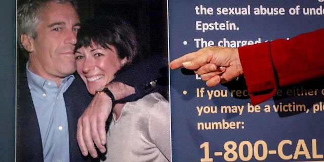 Audrey Strauss, acting U.S. attorney for the Southern District of New York, points to a photo of Jeffrey Epstein and Ghislaine Maxwell during a news conference in New York, July 2, 2020. 