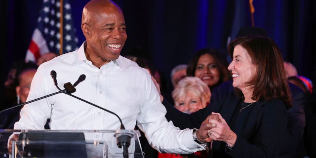 Democratic candidate for New York City Mayor Eric Adams and New York Governor Kathy Hochul greet each other after Adams is declared victor at his election night party in Brooklyn on Nov. 2, 2021.