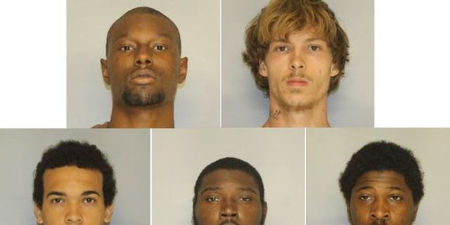 Five men sentenced after using peaceful protest to set fire to police car in Gainesville, Georgia.