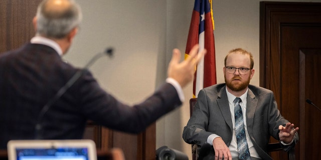 This photo shows the trial of Greg McMichael and his son Travis McMichael and neighbor William