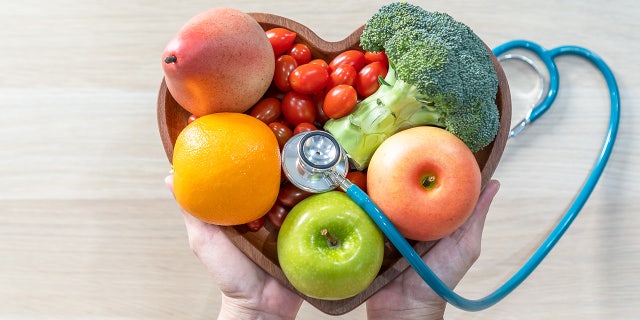 Tomatoes and other fresh, healthy fruits and vegetables are shown in this image — they help support strong heart health, plus they're delicious focal points for a wide array of meals this spring and summer, including the roasted tomatoes recipe featured here. 