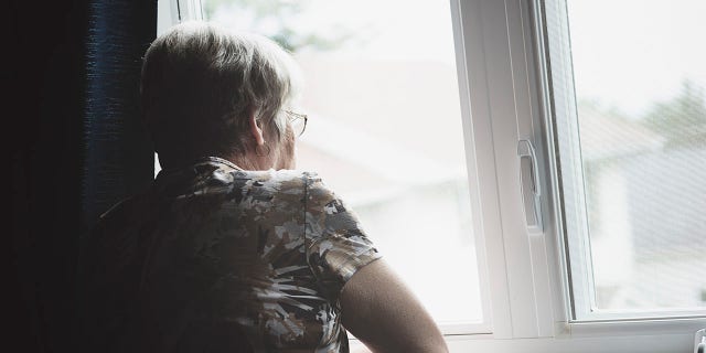 lonely 60 years old senior in is apartment