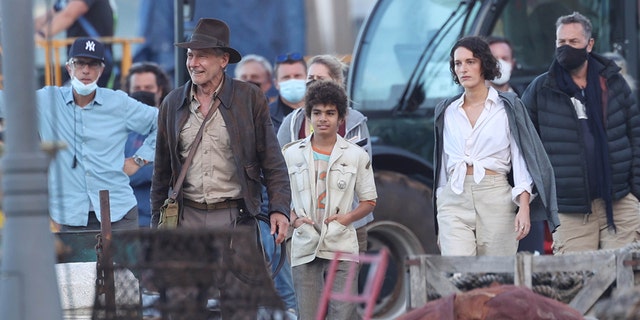 Harrison Ford, Phoebe Waller-Bridge are seen on the set of "Indiana Jones 5" in Sicily on October 18, 2021 in Castellammare del Golfo, Italy. 