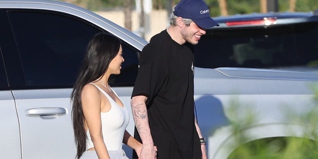 Kim Kardashian, 41, and Pete Davidson, 28, were spotted holding hands while strolling in Palm Springs together.