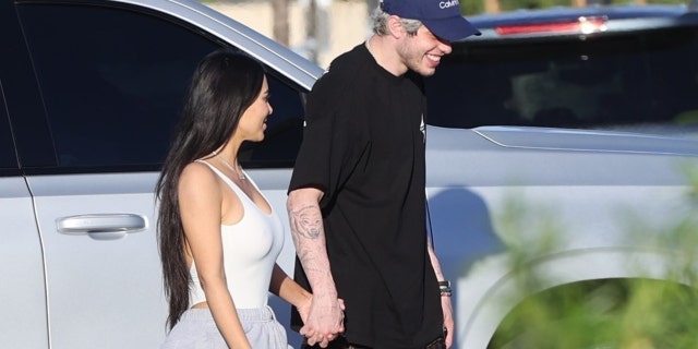Kim Kardashian, 41, and Pete Davidson, 28, were spotted holding hands while strolling in Palm Springs together.