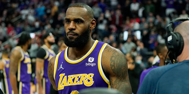 Los Angeles Lakers forward LeBron James is ejected after fouling Detroit Pistons center Isaiah Stewart during the second half of an NBA basketball game, Sunday, Nov. 21, 2021, in Detroit. (AP Photo/Carlos Osorio)