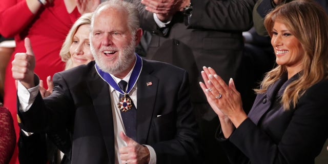 Rush Limbaugh reacts as he is awarded the Presidential Medal of Freedom by first lady Melania Trump during President Trump's State of the Union address at the Capitol in Washington on Feb. 4, 2020. (REUTERS/Jonathan Ernst/File Photo)