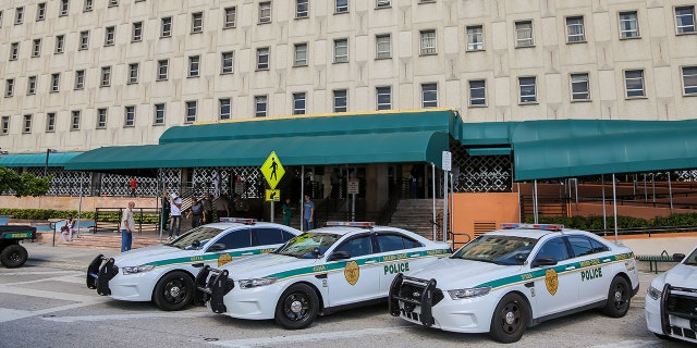 Police cars outside the Miami-Dade County courthouse in Miami, Florida, on Nov. 8, 2019.