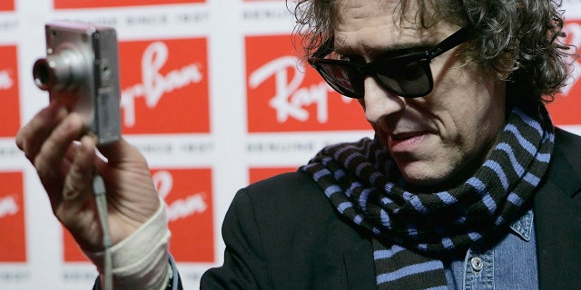 Photographer Mick Rock, whose iconic portraits of rock stars saw him baptized "the man who shot the 70s," is dead. He was 72. A statement posted Friday on Rock's official social media accounts said "it is with the heaviest of hearts that we share our beloved psychedelic renegade Mick Rock has made the Jungian journey to the other side." No cause of death was reported.