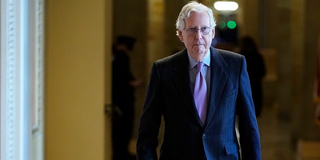 Senate Minority Leader Mitch McConnell walks to the Senate Chamber on Capitol Hill on Nov. 3, 2021 in Washington.