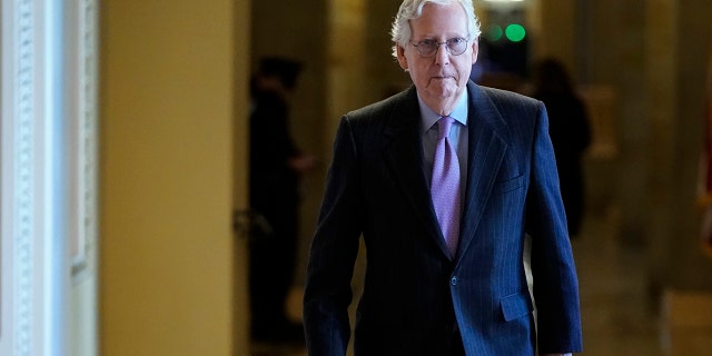 Senate Minority Leader Mitch McConnell walks to the Senate Chamber on Capitol Hill on Nov. 3, 2021 in Washington.