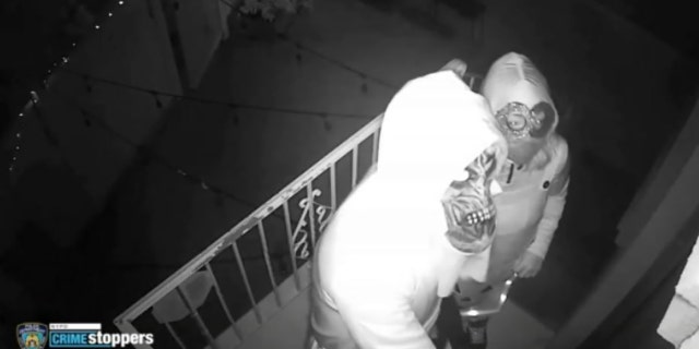 A man and a woman wearing Halloween costumes and masks knocked on the door of the 37-year-old victim's house and said "Trick or treat," according to police.
