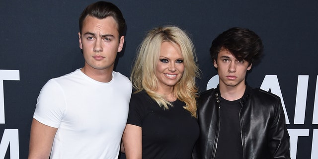 Actress Pamela Anderson and sons Brandon Thomas Lee (L) and Dylan Jagger Lee (R). 