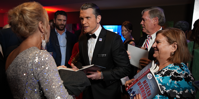 Pete Hegseth signs copies of his book ‘Modern Warriors’ at the Patriot Awards 