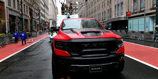 NEW YORK, NEW YORK - NOVEMBER 26: A view of Santa Claus's sleigh float, pulled by a red Ram TRX Truck, at the 94th Annual Macy's Thanksgiving Day Parade® on November 26, 2020 in New York City. The World-Famous Macy's Thanksgiving Day Parade® kicks off the holiday season for millions of television viewers watching safely at home. (Photo by Eugene Gologursky/Getty Images for Macy's Inc.)