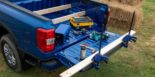 The Ford Ranger tailgate is designed with features that make it easier to be used as a workbench.