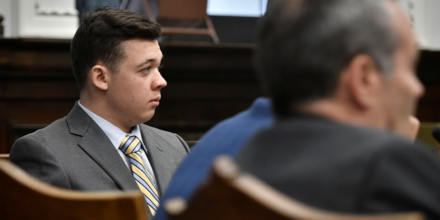 Kyle Rittenhouse listens as Judge Bruce Schroeder talks at the Kenosha County Courthouse in Kenosha, Wisconsin, Nov. 17, 2021. 