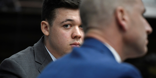 Kyle Rittenhouse listens as Judge Bruce Schroeder talks about how the jury will view video during deliberations in Kyle Rittenhouse's trial at the Kenosha County Courthouse in Kenosha, Wisconsin, Nov. 17, 2021.