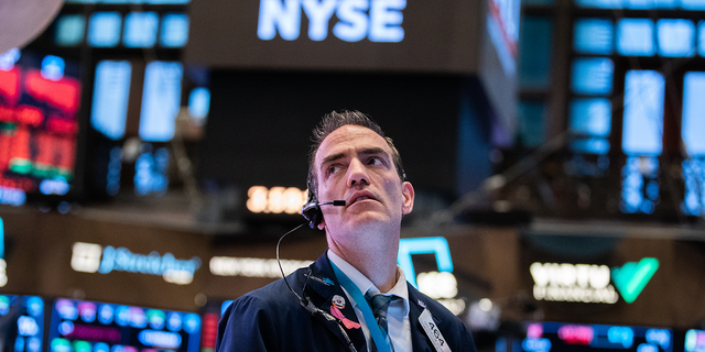 Stocks Take Another Plunge As Economic Uncertainty Over Coronavirus Continues NEW YORK, NY - MARCH 11: Traders work on the floor of the New York Stock Exchange (NYSE) on March 11, 2020 in New York City. The Dow plunged more than 1400 points as Coronavirus cases rose around the world. 