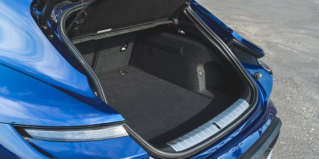 The long roofline and hatchback provide better cargo carrying capability than the sedan.