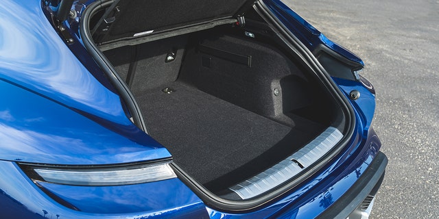 The long roofline and hatchback provide better cargo carrying capability than the sedan.