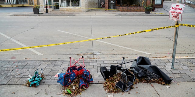 Chairs are left abandoned on Main Street the morning after a car plowed through a holiday parade in Waukesha, Wisconsin.