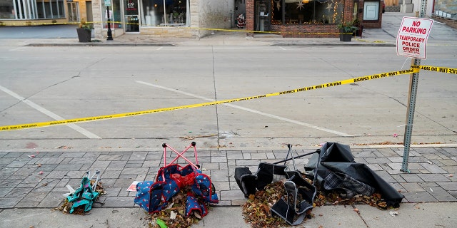 Chairs are left abandoned on Main Street the morning after a car plowed through a holiday parade in Waukesha, Wisconsin.