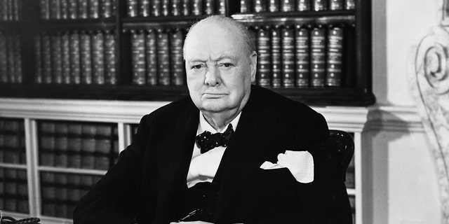 (Original Caption) A new portrait of Sir Winston Churchill the Prme Minister - in the Cabinet Room at No.10 Downing Street. This was specially taken for his 79th birthday which is 30 noviembre. He leaves tomorrow for Bermuda and the Bid Three Conference. (Photo by © Hulton-Deutsch Collection/CORBIS/Corbis via Getty Images)