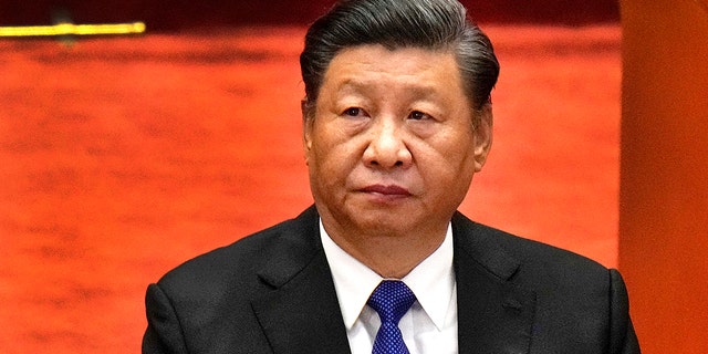 Chinese President Xi Jinping attends an event commemorating the 110th anniversary of the Xinhai Revolution at the Great Hall of the People in Beijing, China, Oct. 9, 2021.  Xi appears to be laying the groundwork for a third term as the all-powerful Communist Party convenes in Beijing.  The official Xinhua News Agency said President and Party Secretary-General Xi issued a draft resolution on the party 