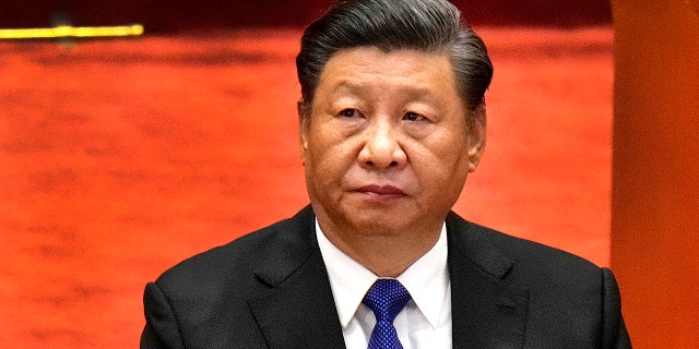Chinese President Xi Jinping attends an event commemorating the 110th anniversary of the Xinhai Revolution at the Great Hall of the People in Beijing, China, Oct. 9, 2021. Xi appears to be laying the groundwork for a third term as the all-powerful Communist Party convenes in Beijing. The official Xinhua News Agency said President and Party Secretary-General Xi issued a draft resolution on the party