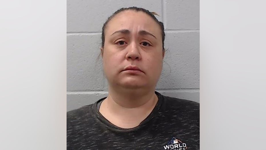 Texas woman accused of pointing loaded gun at child who was trick-or-treating outside her home
