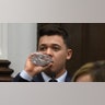 KENOSHA, WISCONSIN - NOVEMBER 10: Kyle Rittenhouse takes a drink of water while testifying during his trial at the Kenosha County Courthouse on November 10, 2021 in Kenosha, Wisconsin. Rittenhouse shot three demonstrators, killing two of them, during a night of unrest that erupted in Kenosha after a police officer shot Jacob Blake seven times in the back while police attempted to arrest him in August 2020. Rittenhouse, from Antioch, Illinois, was 17 at the time of the shooting and armed with an assault rifle. He faces counts of felony homicide and felony attempted homicide. (Photo by Mark Hertzberg-Pool/Getty Images)