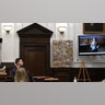KENOSHA, WISCONSIN - NOVEMBER 10: Kyle Rittenhouse watches video of himself on the night of the shootings during cross examination while testifying at his trial at the Kenosha County Courthouse on November 10, 2021 in Kenosha, Wisconsin. Rittenhouse shot three demonstrators, killing two of them, during a night of unrest that erupted in Kenosha after a police officer shot Jacob Blake seven times in the back while police attempted to arrest him in August 2020. Rittenhouse, from Antioch, Illinois, was 17 at the time of the shooting and armed with an assault rifle. He faces counts of felony homicide and felony attempted homicide. (Photo by Mark Hertzberg-Pool/Getty Images)