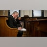 KENOSHA, WISCONSIN - NOVEMBER 10: ?John Black, a use-of-force expert who Kyle Rittenhouse's defense may call to the stand, takes notes as Kyle Rittenhouse testifies in his trial at the Kenosha County Courthouse on November 10, 2021 in Kenosha, Wisconsin. Rittenhouse is accused of shooting three demonstrators, killing two of them, during a night of unrest that erupted in Kenosha after a police officer shot Jacob Blake seven times in the back while being arrested in August 2020. Rittenhouse, from Antioch, Illinois, was 17 at the time of the shooting and armed with an assault rifle. He faces counts of felony homicide and felony attempted homicide. (Photo by Sean Krajacic-Pool/Getty Images)