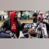 A protester, left, and Emily Cahill argue outside the Kenosha County Courthouse, Tuesday, Nov. 16, 2021 in Kenosha, Wis., during the Kyle Rittenhouse murder trial. Rittenhouse is accused of killing two people and wounding a third during a protest over police brutality in Kenosha, last year.(AP Photo/Nam Y. Huh)