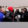 Protesters argue outside the Kenosha County Courthouse, Tuesday, Nov. 16, 2021 in Kenosha, Wis., during the Kyle Rittenhouse murder trial. Rittenhouse is accused of killing two people and wounding a third during a protest over police brutality in Kenosha, last year. (AP Photo/Nam Y. Huh)