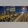 People march across the Brooklyn Bridge against the acquittal of Kyle Rittenhouse on November 19, 2021 in New York City.