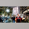 Quanah Brightman marches through Oakland, Calif., Friday, Nov. 19, 2021, with approximately 100 protesters denouncing the acquittal of Kyle Rittenhouse in Kenosha, Wis.