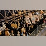 People march across the Brooklyn Bridge against the acquittal of Kyle Rittenhouse on November 19, 2021 in New York City. 