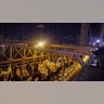 Demonstrators march across the Brooklyn Bridge Friday, Nov. 19, 2021, in New York, following the acquittal of Kyle Rittenhouse in Kenosha, Wis.