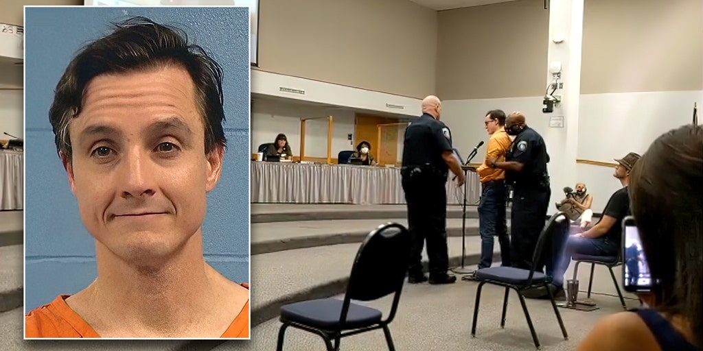 Jeremy-Story-escorted-out.jpg?ve=1&tl=1