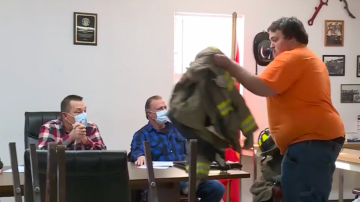 Illinois firefighter hands in gear after man formerly convicted of arson made fire chief.