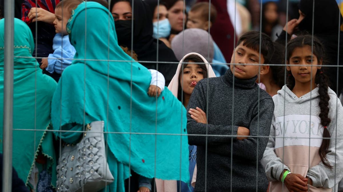 Evacuees from Afghanistan are seen at their temporary shelter inside the U.S. Army Rhine Ordonanz Barracks in Kaiserslautern, Germany, August 30, 2021.